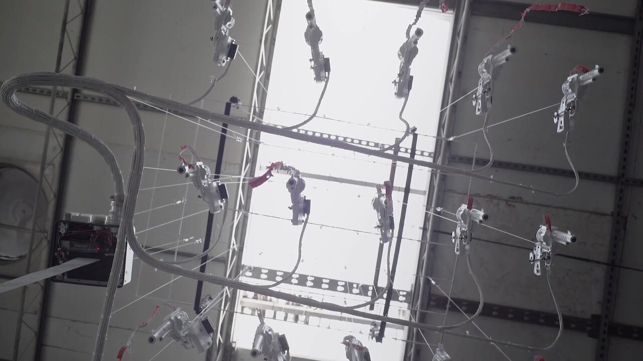 the chandelier of toy cap guns, seen from below
