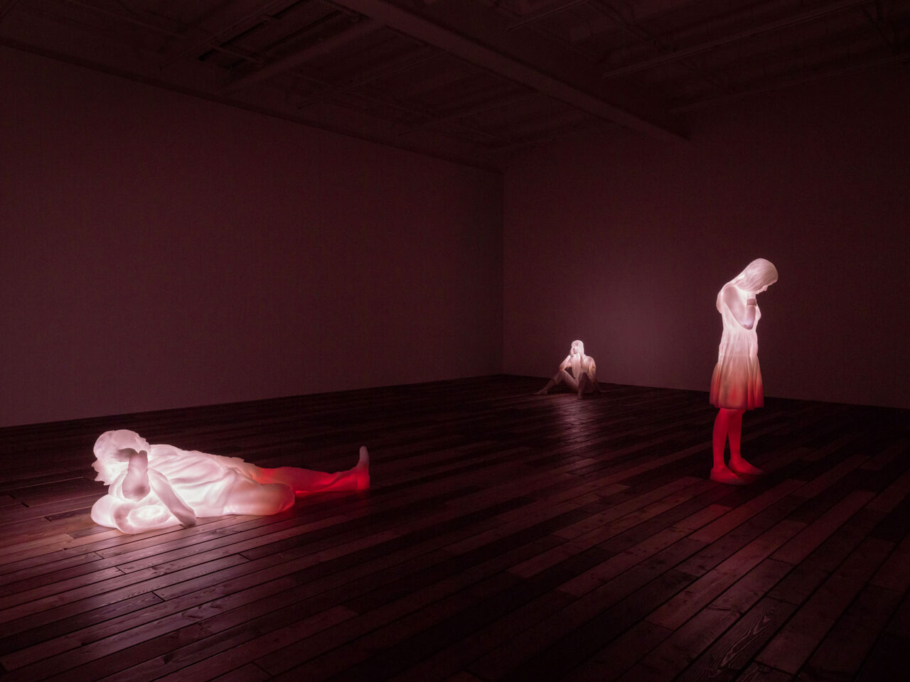 The three sculptures running in unison
